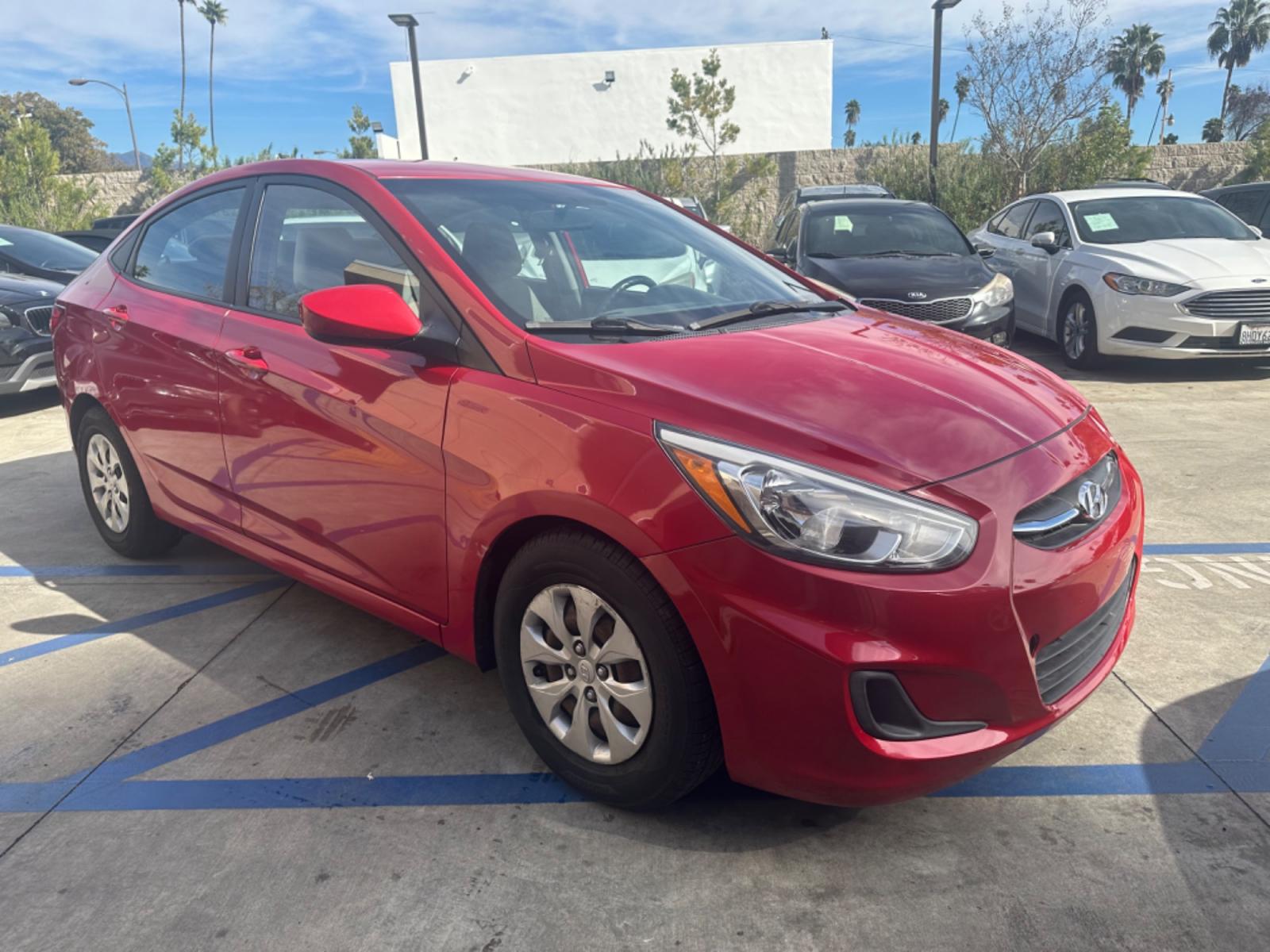 2015 Red /Gray Hyundai Accent GLS Sedan 4D (KMHCT4AE2FU) with an 4-Cyl, 1.6L engine, Auto, 6-Spd w/Overdrive transmission, located at 30 S. Berkeley Avenue, Pasadena, CA, 91107, (626) 248-7567, 34.145447, -118.109398 - The 2015 Hyundai Accent 4-Door Sedan stands as a testament to Hyundai's commitment to quality, efficiency, and value. Located in Pasadena, CA, our dealership specializes in providing a wide range of used BHPH (Buy Here Pay Here) cars, trucks, SUVs, and vans, including the remarkable Hyundai Accent. - Photo #8